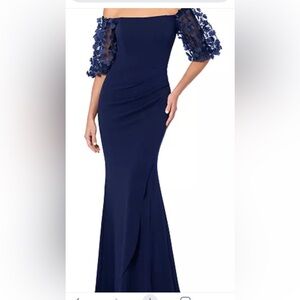 XSCAPE gown, in navy off-the-shoulder neckline sheer short sleeves